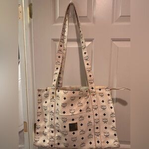 **Project** MCM Ivory and Navy Logo Tote